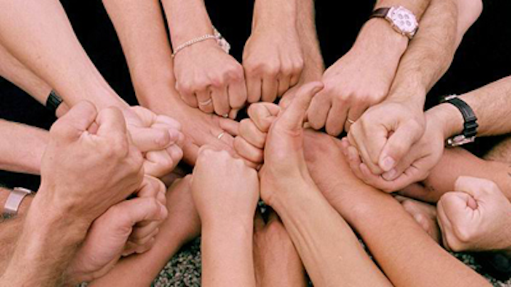 Huddle with hands