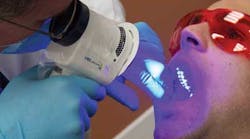 VELscope&circledR; Vx Comprehensive Oral Examination. Image Courtesy of LED Dental Inc.
