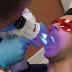 VELscope&circledR; Vx Comprehensive Oral Examination. Image Courtesy of LED Dental Inc.