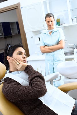 Dental Assistant With Patient