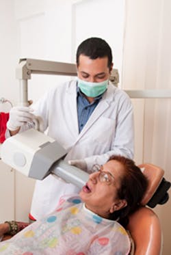 Dentist Taking Xray Dentist Taking Xray