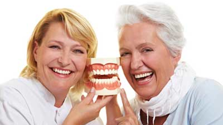 Dentist With Older Patient