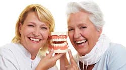Dentist With Older Patient