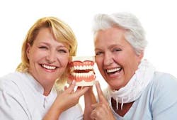 Dentist With Older Patient