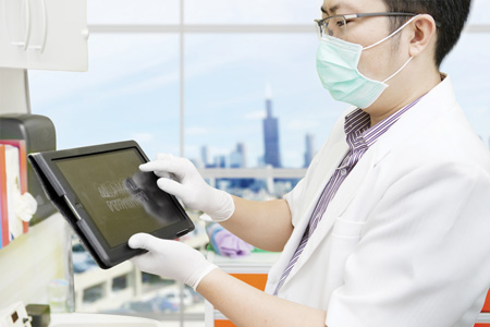 Dentist With Tablet Medium