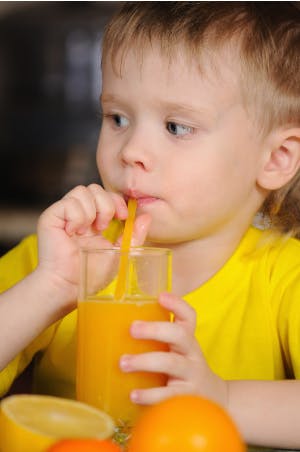 Child Drinking Fruit Juice