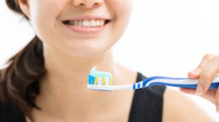 Content Dam Diq Online Articles 2017 08 Woman Holding Toothbrush Dreamstime Thumb