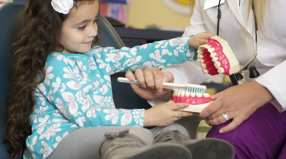 Content Dam Diq En Articles 2014 05 Where Purpose And Practicality Meet The Role Of Dsos In Improving The Oral Health Of Children In America S Underserved Communities Leftcolumn Article Thumbnailimage File