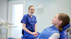 Dentist With Patient