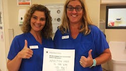 Members of the Children's Dental Surgery Center give the thumbs up during a successful Infection Control Week. Members of the Children's Dental Surgery Center give the thumbs up during a successful Infection Control Week.