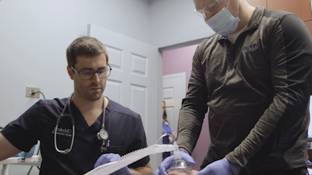 Dr. Spencer Wade working in the clinical setting