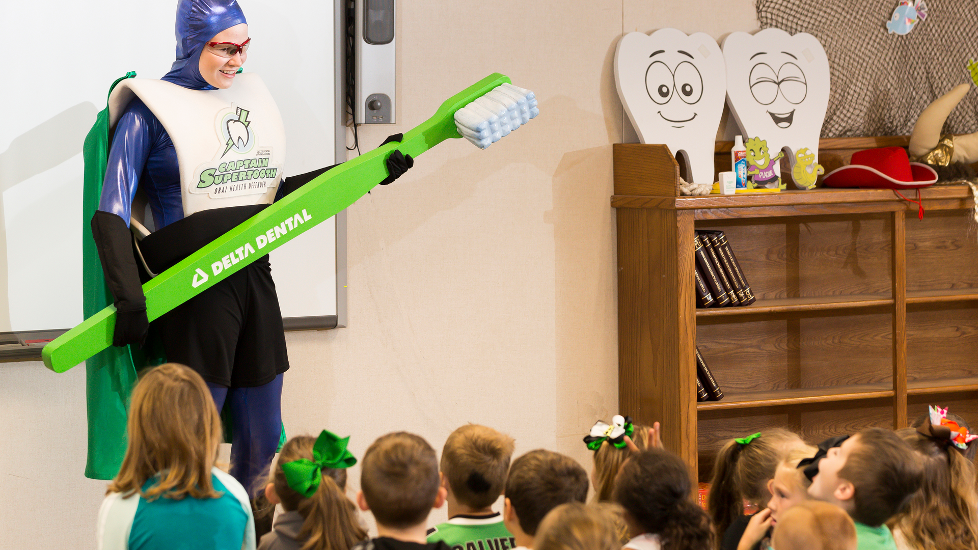 Before the pandemic, Captain Supertooth could perform interactive dental education shows at Oklahoma elementary schools, as shown here. (Courtesy of Delta Dental of Oklahoma)