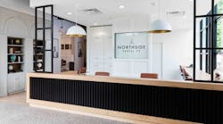 The digital signage behind the administrative desk changes depending on which practice is working that day. The digital signage behind the administrative desk changes depending on which practice is working that day.