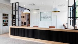 The digital signage behind the administrative desk changes depending on which practice is working that day. The digital signage behind the administrative desk changes depending on which practice is working that day.