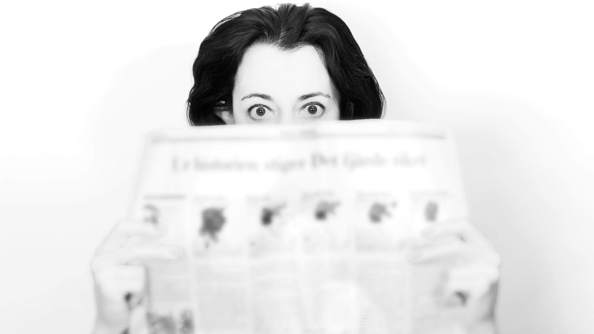 Reading Newspaper 6053a430b59d4