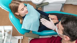 Clinician talking with patient Clinician talking with patient