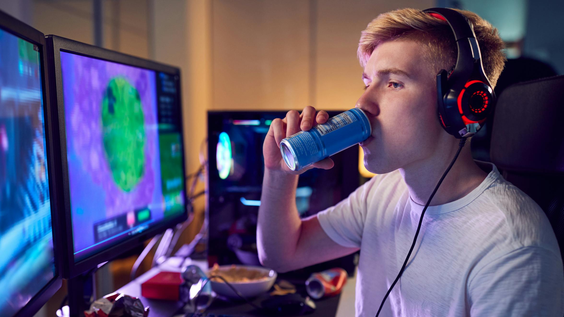 Teenage boy drinking energy drink