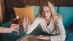 woman refusing alcohol woman refusing alcohol