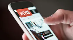 person reading the news