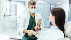 dentist and patient shaking hands dentist and patient shaking hands