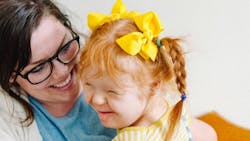 mom holding a little girl mom holding a little girl