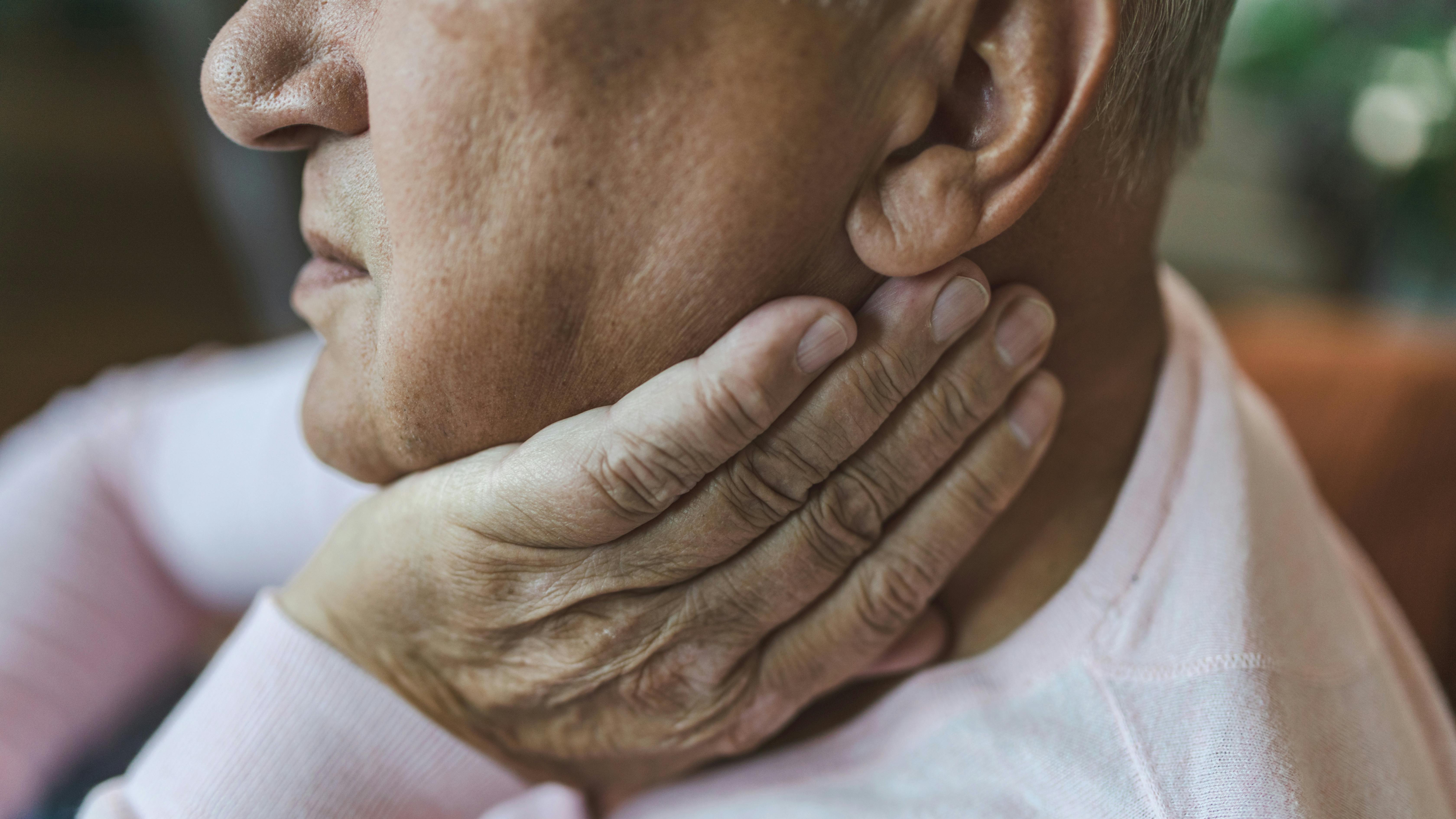 Man with head and neck pain