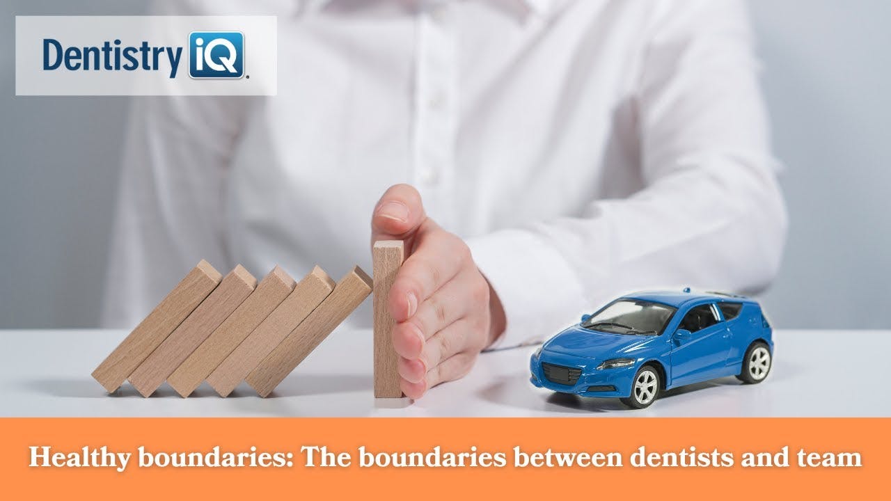 a hand dividing a set of blocks and a toy car representing boundaries