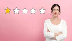 Woman with arms crossed and a one-star review Woman with arms crossed and a one-star review