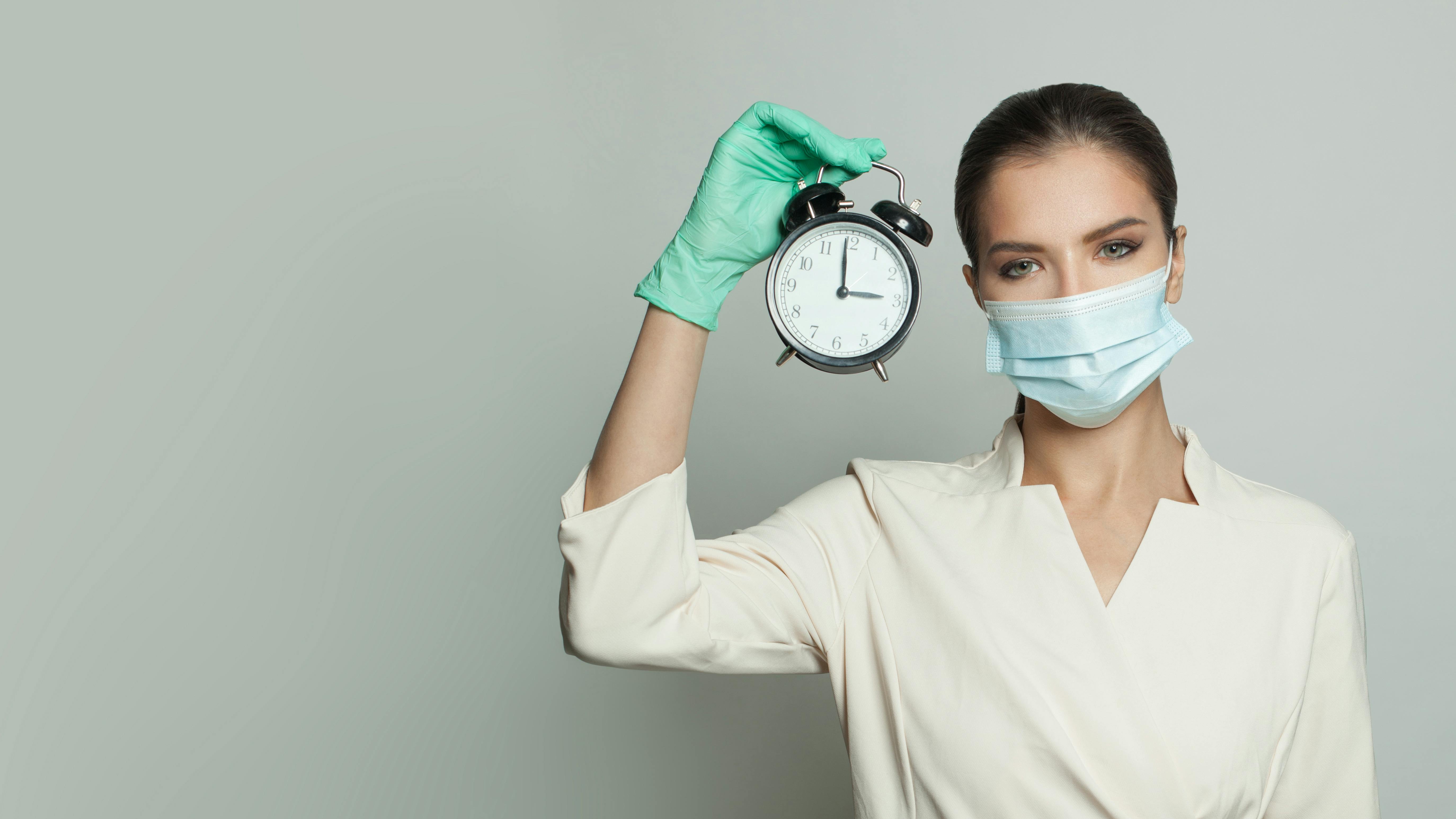 Dentist watching the clock