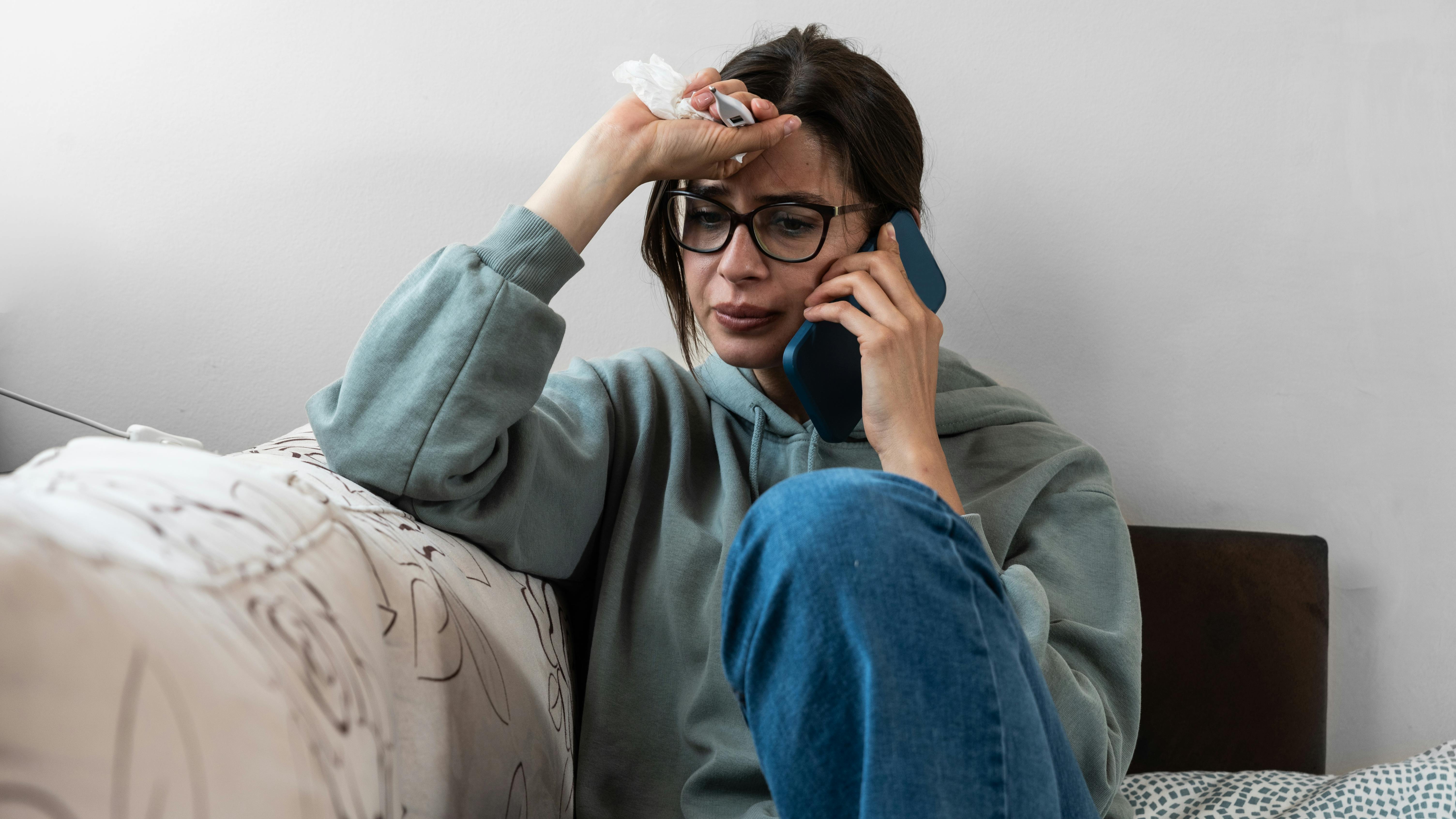 woman who is sick calling her employer