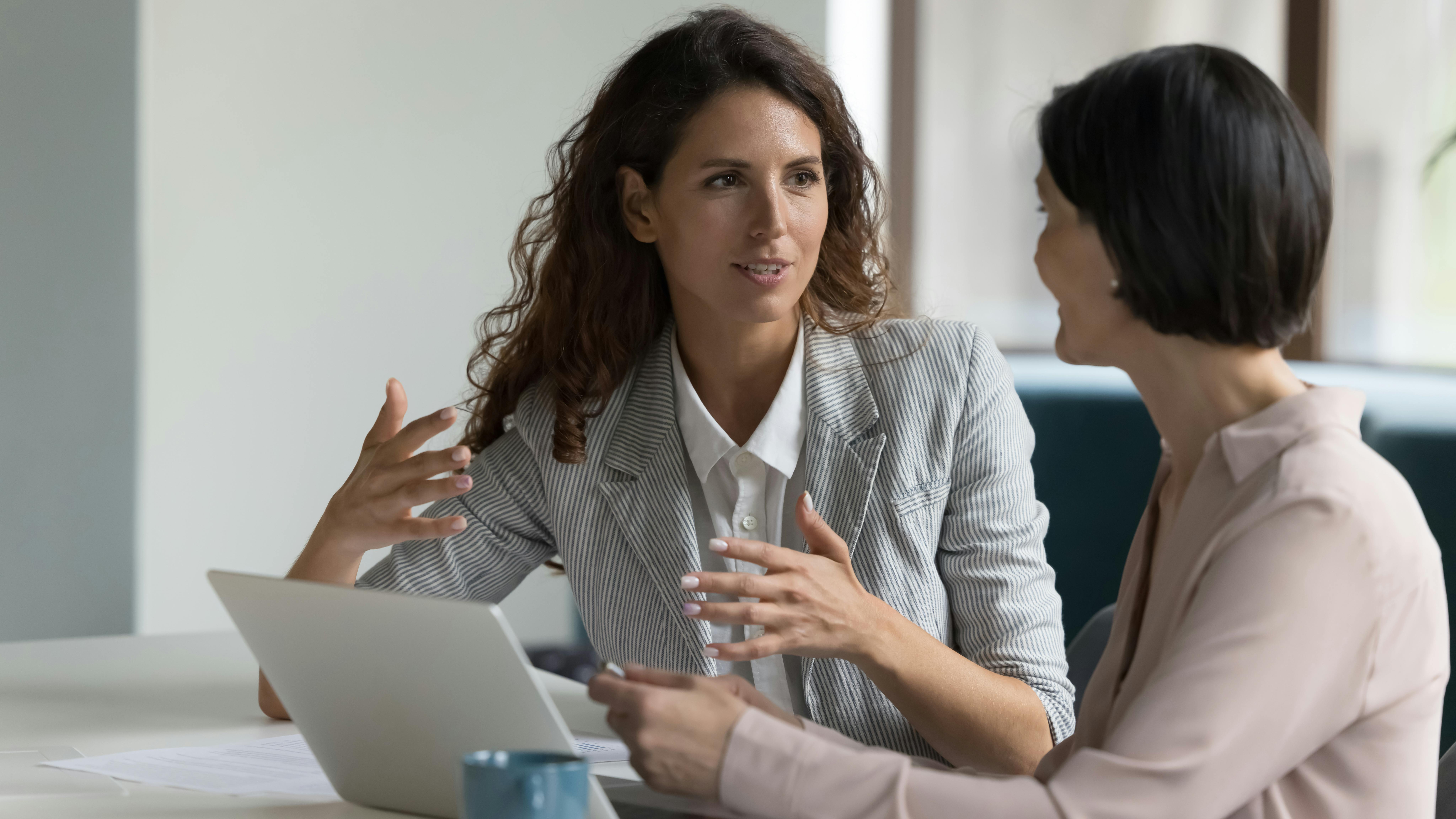 female boss talking to an employee